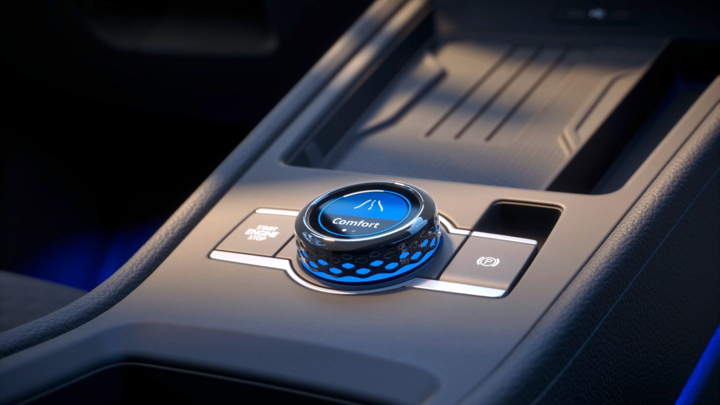 Blick auf den Fahrerlebnisschalter im Volkkswagen T-Roc Life mit Ambientepaket.